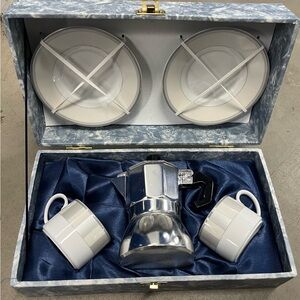 Elegant Silver espresso Set with Cups and Saucers and Moka pot